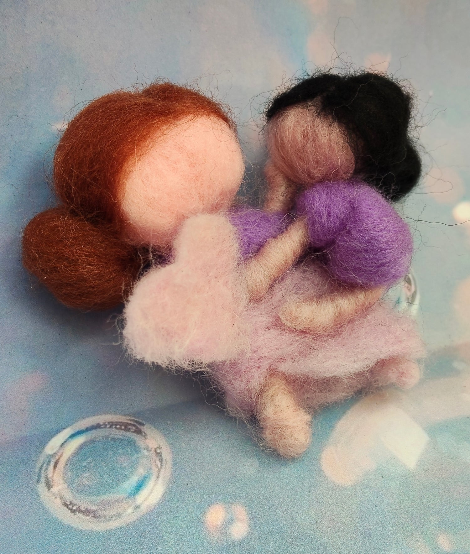 Needle felt fairies and people.
