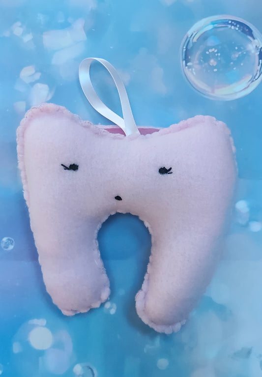 Pink tooth-shaped plush, lost tooth, tooth fairy pouch with a cute face. Personalised name pouch made with beads. 